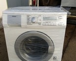 Продавам перфектна пералня със сушилна AEG 16850 7+5 дисплей,